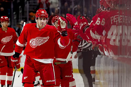 Dec 22, 2023; Detroit, Michigan, USA;  Detroit Red Wings right wing Patrick Kane (88) receives congratulations from teammates after scoring in the first period against the Philadelphia Flyers at Little Caesars Arena. Mandatory Credit: Rick Osentoski-USA TODAY Sports
