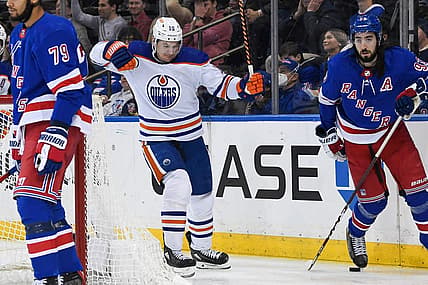 Dec 22, 2023; New York, New York, USA;  Edmonton Oilers left wing Zach Hyman (18) celebrates his goal against the New York Rangers during the third period at Madison Square Garden. Mandatory Credit: Dennis Schneidler-USA TODAY Sports