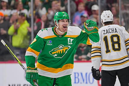 Dec 23, 2023; Saint Paul, Minnesota, USA; Minnesota Wild left wing Marcus Foligno (17) celebrates his goal against the Boston Bruins in the third period at Xcel Energy Center. Mandatory Credit: Brad Rempel-USA TODAY Sports