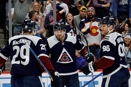 Dec 23, 2023; Denver, Colorado, USA; Colorado Avalanche right wing Valeri Nichushkin (13) celebrates his goal with center Nathan MacKinnon (29) and right wing Mikko Rantanen (96) in the second period against the Arizona Coyotes at Ball Arena. Mandatory Credit: Isaiah J. Downing-USA TODAY Sports
