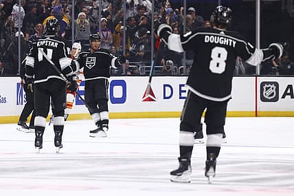 Dec 23, 2023; Los Angeles, California, USA; Los Angeles Kings right wing Quinton Byfield (55) celebrates after scoring a goal against the Calgary Flames during the third period of a game at Crypto.com Arena. Mandatory Credit: Jessica Alcheh-USA TODAY Sports