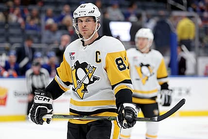 Dec 27, 2023; Elmont, New York, USA; Pittsburgh Penguins center Sidney Crosby (87) skates against the New York Islanders during the third period at UBS Arena. Mandatory Credit: Brad Penner-USA TODAY Sports