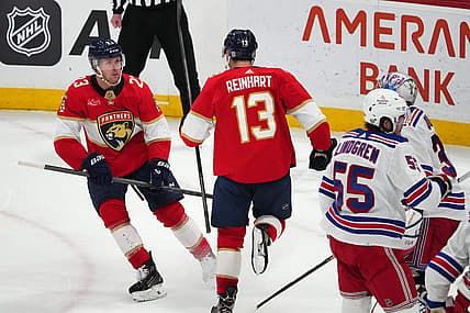 Dec 29, 2023; Sunrise, Florida, USA; Florida Panthers center Sam Reinhart (13) celebrates his goal against the New York Rangers with center Carter Verhaeghe (23) during the second period at Amerant Bank Arena. Mandatory Credit: Jasen Vinlove-USA TODAY Sports