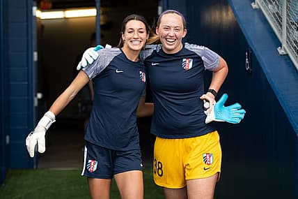 Aug 28, 2022; Kansas City, Kansas, USA; Kansas City Current goalkeeper Sydney Schneider (31) and Kansas City Current goalkeeper Cassie Miller (38) enter the pitch for warm ups before facing the North Carolina Courage at Children's Mercy Park. Mandatory Credit: Amy Kontras-USA TODAY Sports