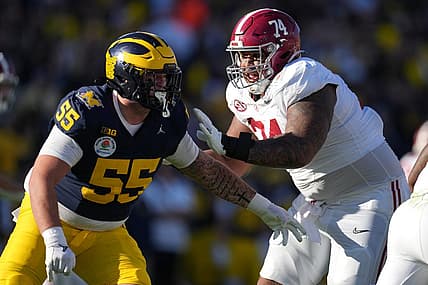 Jan 1, 2024; Pasadena, CA, USA; Alabama Crimson Tide offensive lineman Kadyn Proctor (74) blocks Michigan Wolverines defensive lineman Mason Graham (55) during the first half in the 2024 Rose Bowl college football playoff semifinal game at Rose Bowl. Mandatory Credit: Kirby Lee-USA TODAY Sports