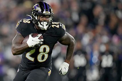 Baltimore Ravens running back Mike Davis (28) carries the ball in the second quarter during an NFL Week 5 game against the Cincinnati Bengals, Sunday, Oct. 9, 2022, at M&T Bank Stadium in Baltimore.

Nfl Cincinnati Bengals At Baltimore Ravens Oct 9 0176