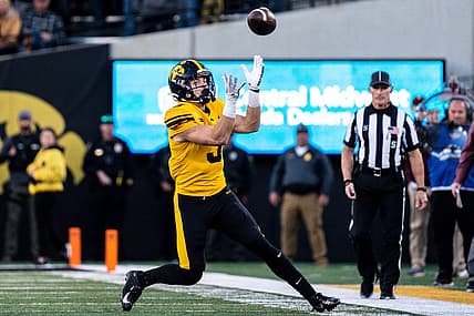 Iowa defensive back Cooper DeJean (3) catches a punt at Kinnick Stadium on Saturday, October 21, 2023 in Iowa City. DeJean returned the punt for a touchdown and it was later called back after review ruled he fair-caught the punt.