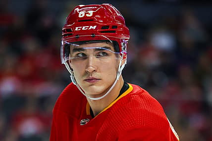 Nov 27, 2023; Calgary, Alberta, CAN; Calgary Flames center Adam Ruzicka (63) during the face off against the Vegas Golden Knights during the second period at Scotiabank Saddledome. Mandatory Credit: Sergei Belski-USA TODAY Sports