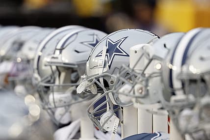 Jan 7, 2024; Landover, Maryland, USA; A view of Dallas Cowboys players' helmets on the bench against the Washington Commanders during the first quarter at FedExField. Mandatory Credit: Geoff Burke-USA TODAY Sports