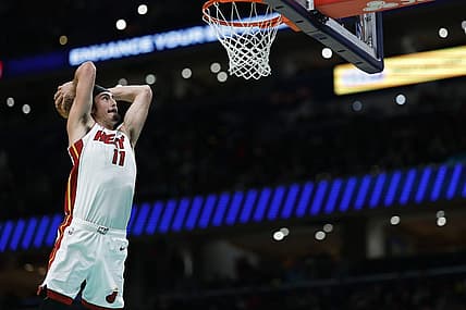 Feb 2, 2024; Washington, District of Columbia, USA; Miami Heat guard Jaime Jaquez Jr. (11) dunks the ball against the Washington Wizards in the first half at Capital One Arena. Mandatory Credit: Geoff Burke-USA TODAY Sports