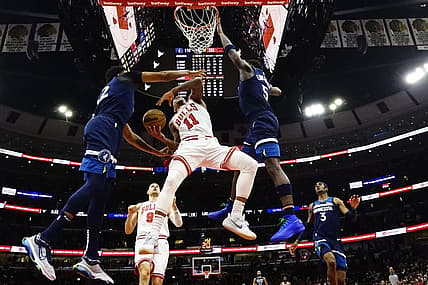 Feb 6, 2024; Chicago, Illinois, USA; Chicago Bulls forward DeMar DeRozan (11) is defended by Minnesota Timberwolves guard Anthony Edwards (5) during the second half at United Center. Mandatory Credit: David Banks-USA TODAY Sports