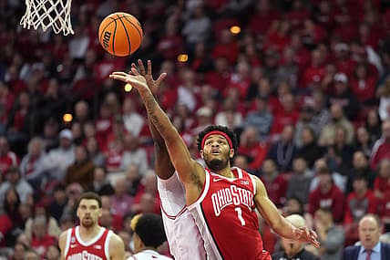 Feb 13, 2024; Madison, Wisconsin, USA;  Ohio State Buckeyes guard Roddy Gayle Jr. (1) scores against Wisconsin Badgers guard AJ Storr (2) during the first half at the Kohl Center. Mandatory Credit: Kayla Wolf-USA TODAY Sports