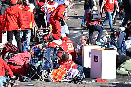 Feb 14, 2024; Kansas City, MO, USA; Fans shelter in place after shots were fired after the celebration of the Kansas City Chiefs winning Super Bowl LVIII. Mandatory Credit: David Rainey-USA TODAY Sports