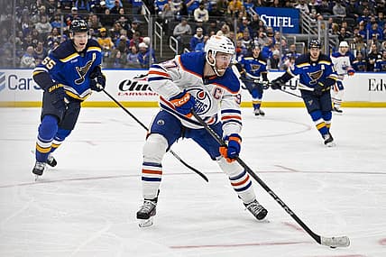Feb 15, 2024; St. Louis, Missouri, USA;  Edmonton Oilers center Connor McDavid (97) controls the puck against the St. Louis Blues during the third period at Enterprise Center. Mandatory Credit: Jeff Curry-USA TODAY Sports