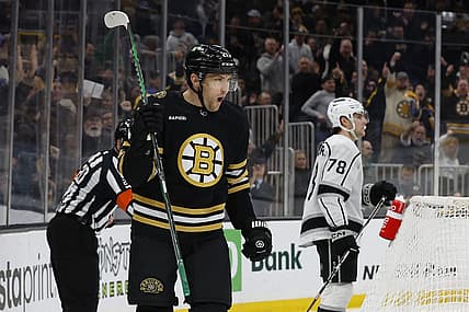 Feb 17, 2024; Boston, Massachusetts, USA; Boston Bruins left wing James van Riemsdyk (21) celebrates the first of his two goals during the first period as Los Angeles Kings right wing Alex Laferriere (78) skates away at TD Garden. Mandatory Credit: Winslow Townson-USA TODAY Sports