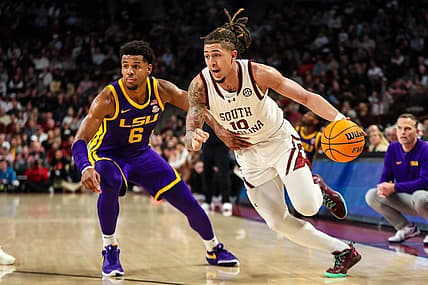 Feb 17, 2024; Columbia, South Carolina, USA; South Carolina Gamecocks guard Myles Stute (10) drives past LSU Tigers guard Jordan Wright (6) in the first half at Colonial Life Arena. Mandatory Credit: Jeff Blake-USA TODAY Sports