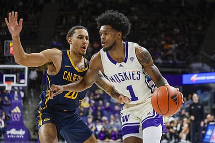 Feb 17, 2024; Seattle, Washington, USA; Washington Huskies forward Keion Brooks Jr. (1) dribbles against California Golden Bears guard Jaylon Tyson (20) during the first half at Alaska Airlines Arena at Hec Edmundson Pavilion. Mandatory Credit: Joe Nicholson-USA TODAY Sports