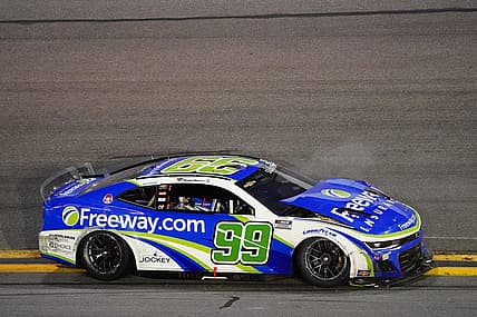Feb 19, 2024; Daytona Beach, Florida, USA; NASCAR Cup Series driver Daniel Suarez (99) wrecks during the Daytona 500 at Daytona International Speedway. Mandatory Credit: John David Mercer-USA TODAY Sports