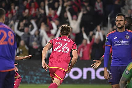 Feb 20, 2024; St. Louis, MO, USA; St. Louis City defender Tim Parker (26) reacts after scoring a goal against the Houston Dynamo during the second half of the CONCACAF Champions Cup-Round One at CITYPARK. Mandatory Credit: Joe Puetz-USA TODAY Sports