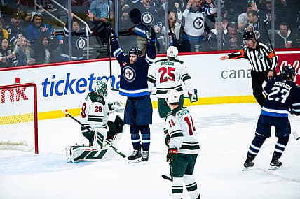 Feb 20, 2024; Winnipeg, Manitoba, CAN; Winnipeg Jets forward Gabriel Vilardi (13) celebrates his goal against the Minnesota Wild during third period at Canada Life Centre. Mandatory Credit: Terrence Lee-USA TODAY Sports