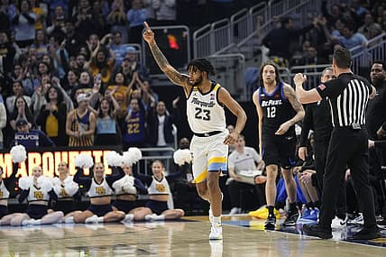 Feb 21, 2024; Milwaukee, Wisconsin, USA;  Marquette Golden Eagles forward David Joplin (23) celebrates after scoring a basket during the first half against the DePaul Blue Demons at Fiserv Forum. Mandatory Credit: Jeff Hanisch-USA TODAY Sports