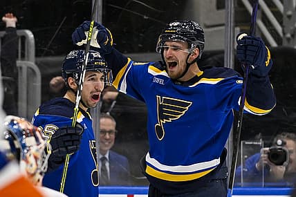 Feb 22, 2024; St. Louis, Missouri, USA;  St. Louis Blues left wing Pavel Buchnevich (89) celebrates with center Jordan Kyrou (25) after scoring his second goal of the game against New York Islanders goaltender Semyon Varlamov (40) during the second period at Enterprise Center. Mandatory Credit: Jeff Curry-USA TODAY Sports