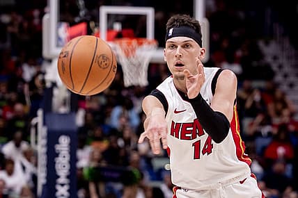 Feb 23, 2024; New Orleans, Louisiana, USA;  Miami Heat guard Tyler Herro (14) passes the ball against the New Orleans Pelicans during the first half at Smoothie King Center. Mandatory Credit: Stephen Lew-USA TODAY Sports