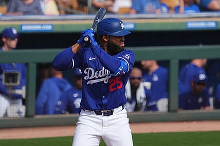 Feb 25, 2024; Phoenix, Arizona, USA; Los Angeles Dodgers designated hitter Manuel Margot (25) bats against the Oakland Athletics during the third inning at Camelback Ranch-Glendale. Mandatory Credit: Joe Camporeale-USA TODAY Sports