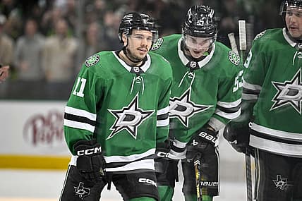 Feb 26, 2024; Dallas, Texas, USA; Dallas Stars center Logan Stankoven (11) and center Wyatt Johnston (53) skates off the ice after Stankoven scores his first career NHL goal during the second period against the New York Islanders at the American Airlines Center. Mandatory Credit: Jerome Miron-USA TODAY Sports