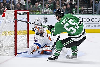 Feb 26, 2024; Dallas, Texas, USA; New York Islanders goaltender Ilya Sorokin (30) stops a breakaway shot by Dallas Stars defenseman Thomas Harley (55) during the second period at the American Airlines Center. Mandatory Credit: Jerome Miron-USA TODAY Sports
