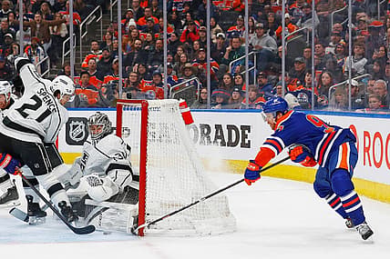 Feb 26, 2024; Edmonton, Alberta, CAN; Edmonton Oilers forward Connor McDavid (97) tries a wrap-around on Los Angeles Kings goaltender David Rittich (31) during the second period at Rogers Place. Mandatory Credit: Perry Nelson-USA TODAY Sports
