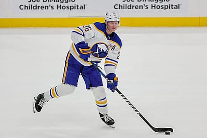 Feb 27, 2024; Sunrise, Florida, USA; Buffalo Sabres defenseman Rasmus Dahlin (26) moves the puck against the Florida Panthers during the first period at Amerant Bank Arena. Mandatory Credit: Sam Navarro-USA TODAY Sports