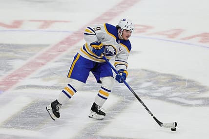 Feb 27, 2024; Sunrise, Florida, USA; Buffalo Sabres left wing Zach Benson (9) moves the puck against the Florida Panthers during the third period at Amerant Bank Arena. Mandatory Credit: Sam Navarro-USA TODAY Sports