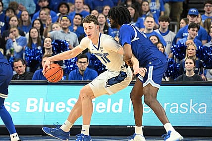 Feb 28, 2024; Omaha, Nebraska, USA; Creighton Bluejays center Ryan Kalkbrenner (11) drives against Seton Hall Pirates center Jaden Bediako (15) in the first half at CHI Health Center Omaha. Mandatory Credit: Steven Branscombe-USA TODAY Sports