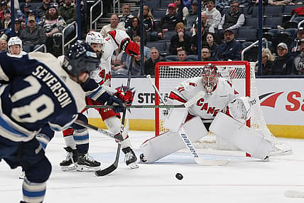 Feb 29, 2024; Columbus, Ohio, USA; Carolina Hurricanes goalie Spencer Martin (41) awaits the shot attempt from Columbus Blue Jackets defenseman Damon Severson (78) during the first period at Nationwide Arena. Mandatory Credit: Russell LaBounty-USA TODAY Sports