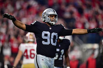 January 1, 2023; Paradise, Nevada, USA; Las Vegas Raiders defensive tackle Jerry Tillery (90) reacts after San Francisco 49ers place kicker Robbie Gould (9) misses a field goal during the second half at Allegiant Stadium. Mandatory Credit: Gary A. Vasquez-USA TODAY Sports