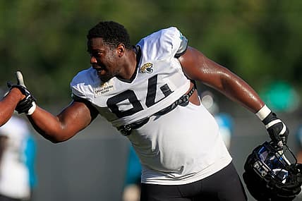 Jacksonville Jaguars defensive tackle Folorunso Fatukasi (94) greets defensive end Dawuane Smoot (91) Dawuane Smoot during training camp Monday, Aug. 7, 2023 at Miller Electric Center at EverBank Stadium in Jacksonville, Fla. This was the 11th day of training camp.