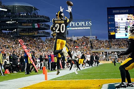 Dec 23, 2023; Pittsburgh, PA, USA; Pittsburgh Steelers cornerback Patrick Peterson (20) intercepts a pass in the first quarter during a Week 16 NFL football game between the Cincinnati Bengals and the Pittsburgh Steelers at Acrisure Stadium. Mandatory Credit: Kareem Elgazzar-USA TODAY Sports