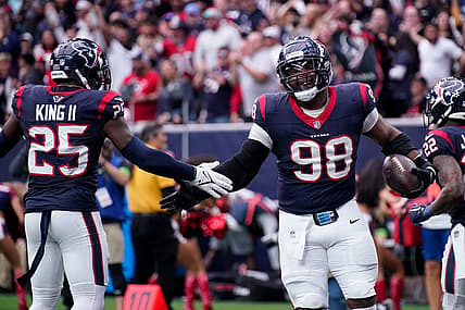 Houston Texans defensive tackle Sheldon Rankins (98) celebrates his touchdown off a ball fumbled by Tennessee Titans quarterback Will Levis during the second quarter at NRG Stadium in Houston, Texas., Sunday, Dec. 31, 2023.