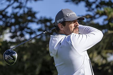 February 2, 2024; Pebble Beach, California, USA; New York Jets quarterback Aaron Rodgers hits his tee shot on the 16th hole during the second round of the AT&T Pebble Beach Pro-Am golf tournament at Pebble Beach Golf Links. Mandatory Credit: Kyle Terada-USA TODAY Sports