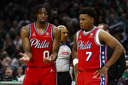 Feb 27, 2024; Boston, Massachusetts, USA; Philadelphia 76ers' Tyrese Maxey (0) talks with Kyle Lowry (7) during the second half of their loss to the Boston Celtics at TD Garden. Mandatory Credit: Winslow Townson-USA TODAY Sports