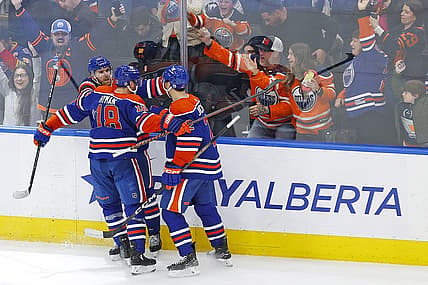 Feb 28, 2024; Edmonton, Alberta, CAN; The Edmonton Oilers celebrate a goal scored by forward Connor McDavid (97) during overtime against the St. Louis Blues at Rogers Place. Mandatory Credit: Perry Nelson-USA TODAY Sports