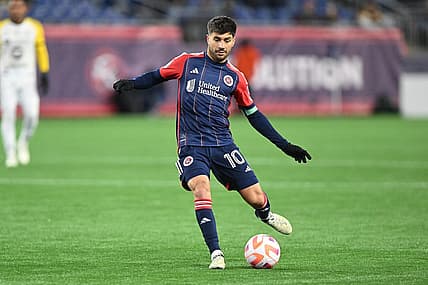 Feb 29, 2024; Foxborough, MA, USA; New England Revolution midfielder Carles Gil (10) passes the ball against the Club Atletico Independiente during the first half at Gillette Stadium. Mandatory Credit: Brian Fluharty-USA TODAY Sports