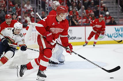 Mar 2, 2024; Detroit, Michigan, USA; Detroit Red Wings defenseman Olli Maatta (2) skates with the puck in the third period against the Florida Panthers at Little Caesars Arena. Mandatory Credit: Rick Osentoski-USA TODAY Sports