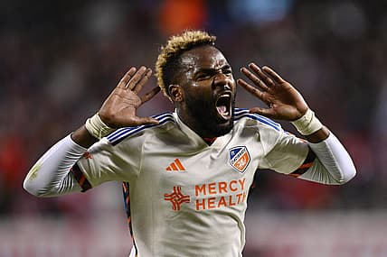 Mar 2, 2024; Chicago, Illinois, USA; FC Cincinnati forward Aaron Boupendza (9) celebrates after scoring against the Chicago Fire FC in the first half at Soldier Field. Mandatory Credit: Jamie Sabau-USA TODAY Sports