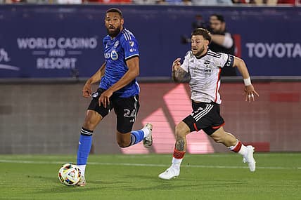 Mar 2, 2024; Frisco, Texas, USA; CF Montreal defender George Campbell (24) controls the ball against FC Dallas forward Paul Arriola (7) during the first half at Toyota Stadium. Mandatory Credit: Andrew Dieb-USA TODAY Sports