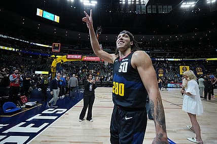 Mar 7, 2024; Denver, Colorado, USA; Denver Nuggets forward Aaron Gordon (50) waves to the crowd following the game against the Boston Celtics at Ball Arena. Mandatory Credit: Ron Chenoy-USA TODAY Sports