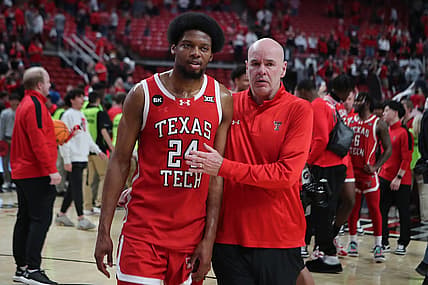 Mar 9, 2024; Lubbock, Texas, USA;  Texas Tech Red Raiders guard Kerwin Walton (24) with assistant coach Dave Smart after the game against the Baylor Bears at United Supermarkets Arena. Mandatory Credit: Michael C. Johnson-USA TODAY Sports