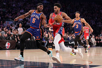 Mar 10, 2024; New York, New York, USA; Philadelphia 76ers forward Tobias Harris (12) drives to the basket against New York Knicks forward Precious Achiuwa (5) and guard Josh Hart (3) during the first quarter at Madison Square Garden. Mandatory Credit: Brad Penner-USA TODAY Sports