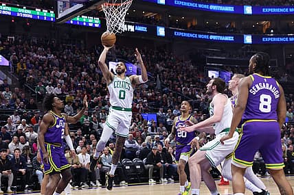 Mar 12, 2024; Salt Lake City, Utah, USA; Boston Celtics forward Jayson Tatum (0) lays the ball up against the Utah Jazz during the first quarter at Delta Center. Mandatory Credit: Rob Gray-USA TODAY Sports